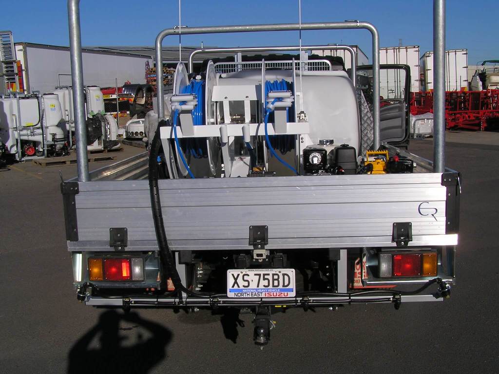 Truck-mounted 600-litre tank with dual quikspray reels, high capacity high-pressure product pump with single impeller fire fighting unit used by Electel Resources